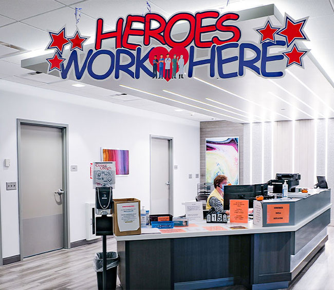 Heroes work here - sympaticare front desk.